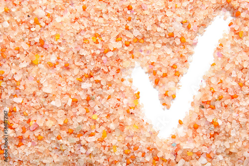 Check mark made of sea salt...