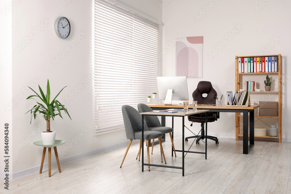 Director's office with large wooden table and comfortable armchairs. Interior design Director's office with large wooden table and comfortable armchairs. Interior design