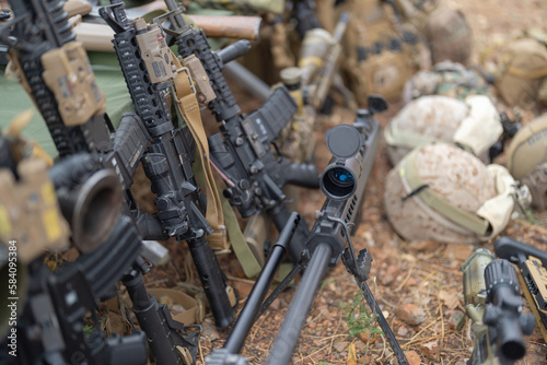 Gun weapons bags and bullets for Army marine corps soldier military war participating and preparing to attack the enemy in Thailand during Exercise Cobra Gold in battle. Combat force training.