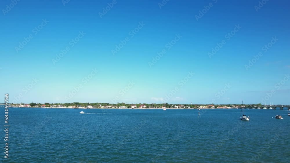 Aerial view passing cannons and a tower, towards the sea, at Castillo De San Marcos, in sunny St. Augustine, Florida, USA Aerial view passing cannons and a tower, towards the sea, at Castillo De San Marcos, in sunny St. Augustine, Florida, USA