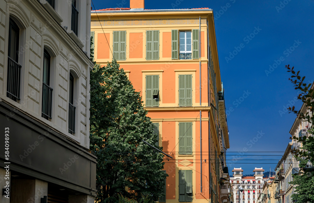 Naklejka premium Traditional Mediterranean houses, ornate metal work and shutters in Nice, France