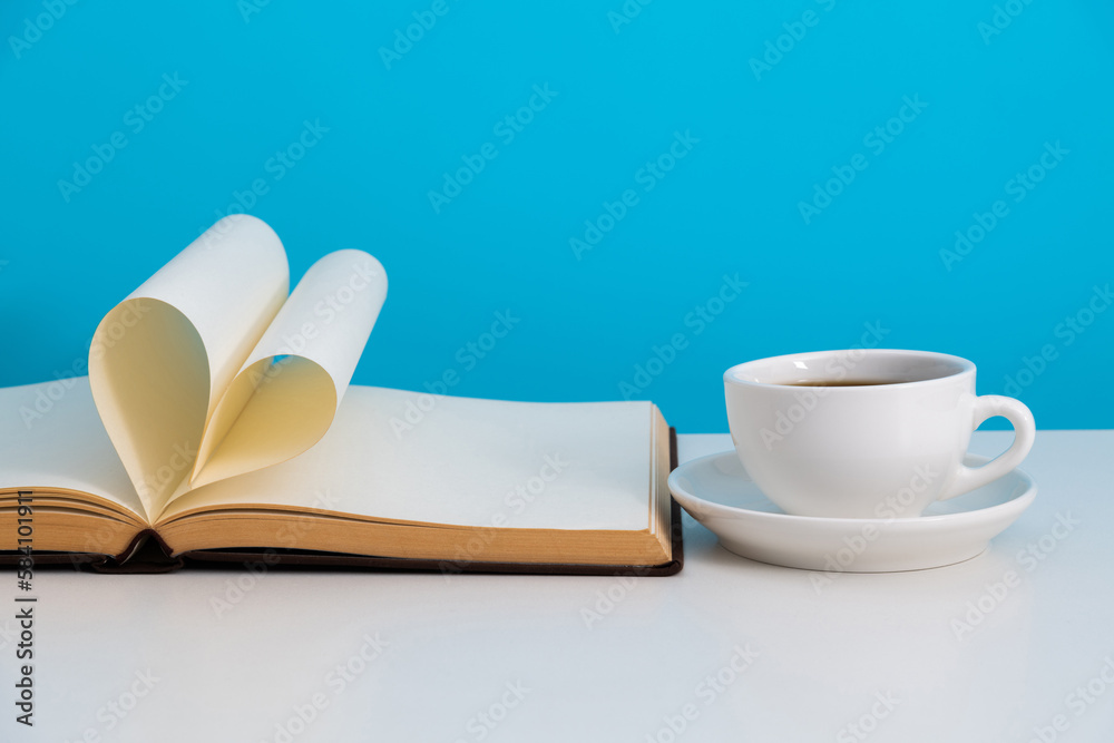 Book pages curved into heart shape Book pages curved into heart shape