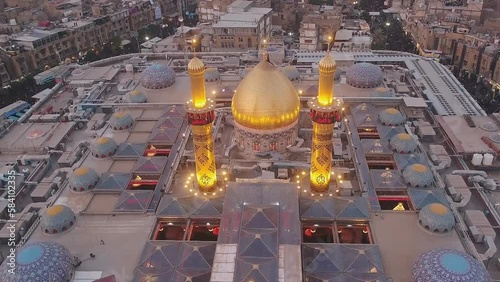 Mosque al-Abbas is one of the largest mosques in the world and one of the main shrines among Shia Muslims. Located in the eastern part of the city of Karbala in Iraq. (aerial photography) photo