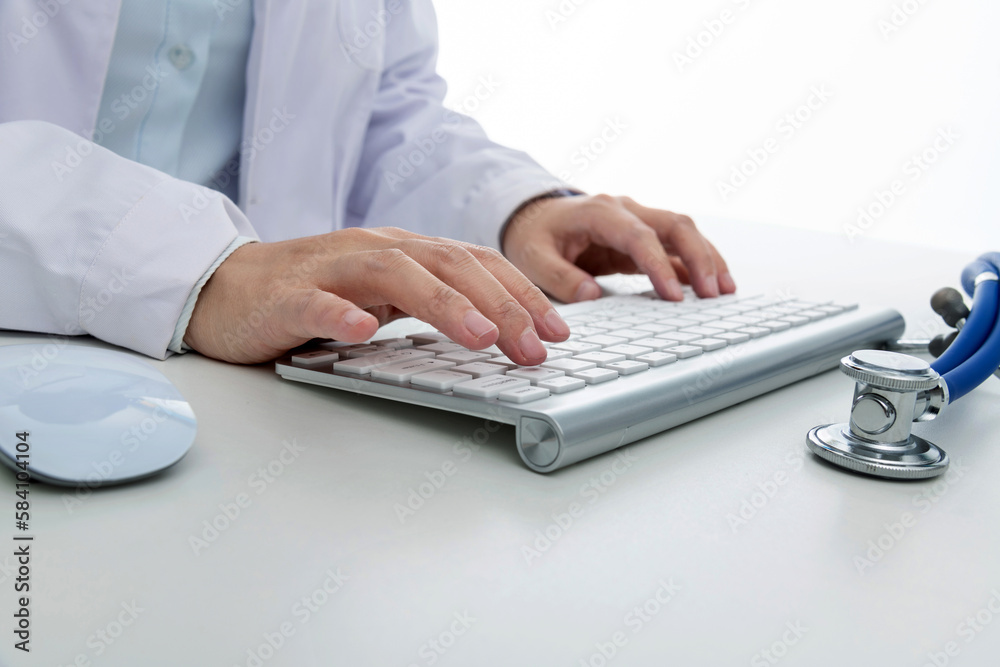 Woman doctor working on computer Woman doctor working on computer