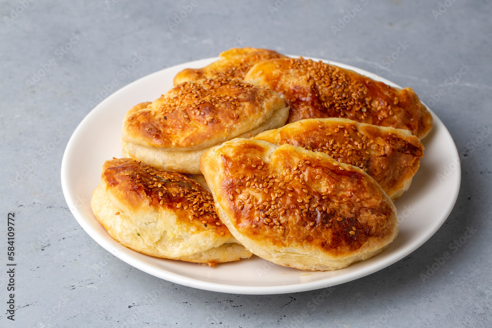 Turkish cuisine; Handmade Cheese spinach Pastry (Turkish name; peynirli - ispanakli pogaca)