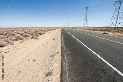 Deserted highway that disappear in the horizon, Southern California
