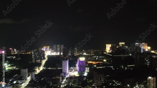 Night sky over the city of Sihanoukville, Cambodia, illuminated by beautiful lights taken by a drone