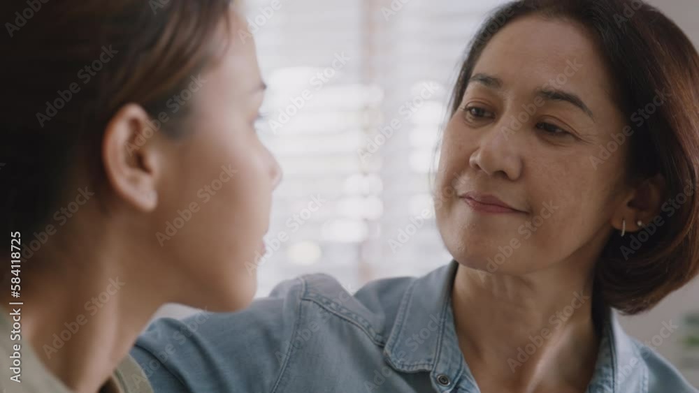 Middle aged asia people old mom love care trust comfort help young teen talk crying stress relief at home. Mum as friend listen adult child woman feel pain sad worry of broken heart life crisis issues Middle aged asia people old mom love care trust comfort help young teen talk crying stress relief at home. Mum as friend listen adult child woman feel pain sad worry of broken heart life crisis issues