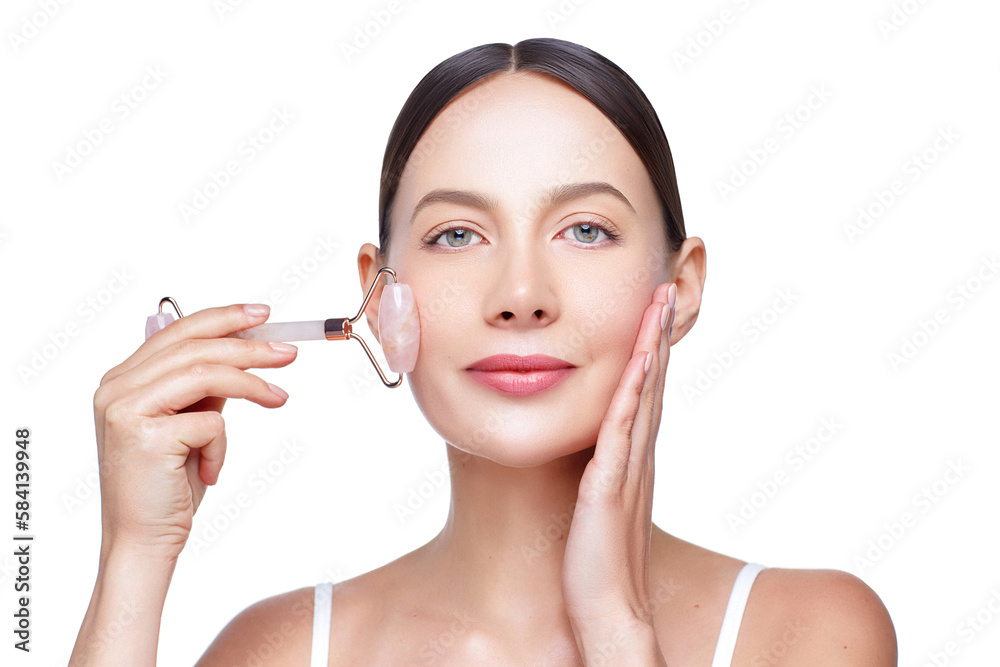 Facial skincare routine. Beauty procedure. Skin therapy. Dermatology. Self massage. Close up portrait of young woman with healthy sking using jade roller, isolated on white