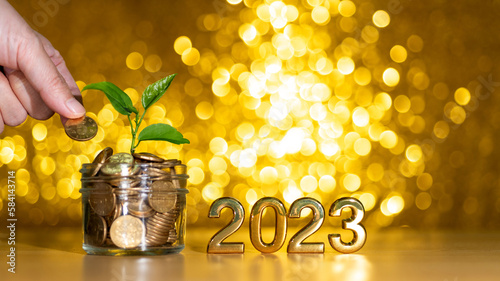 New year 2023 with coin glass jar