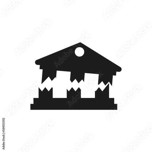 The destroyed cracked collapsed building.