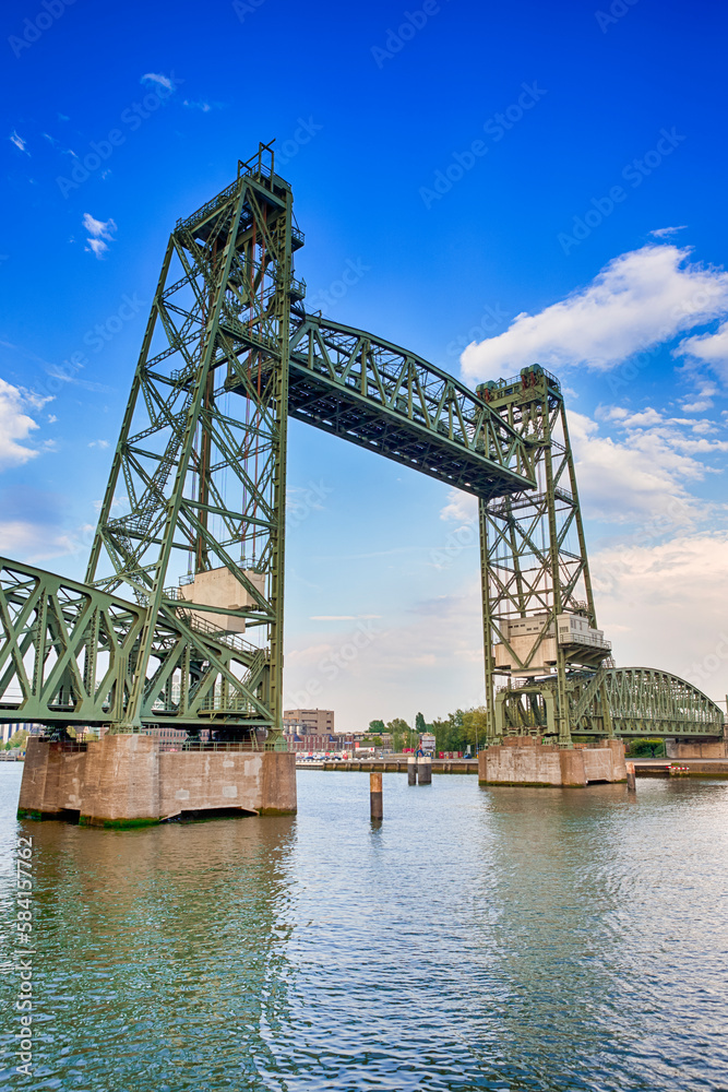 Holland Traveling. Transport Koninginnebrug Bridge in Rotterdam During Daytime. Holland Traveling. Transport Koninginnebrug Bridge in Rotterdam During Daytime.