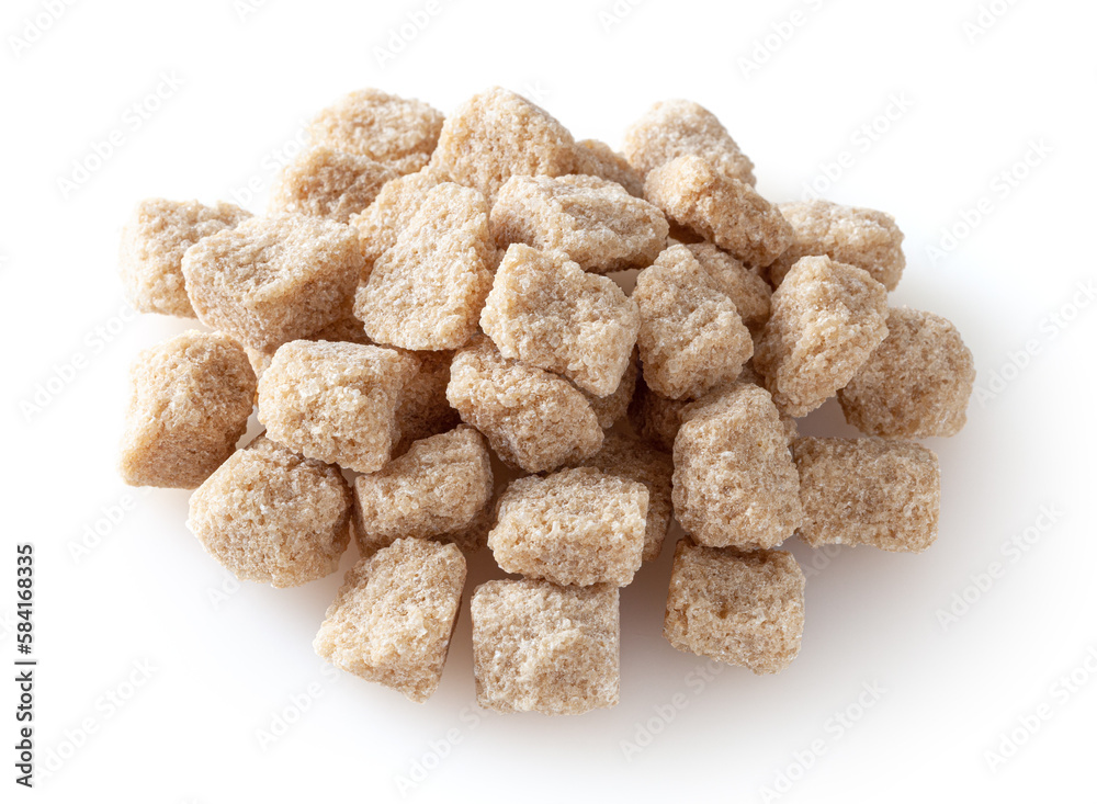Cubes of brown cane sugar isolated on white background