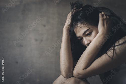 Young depressed woman, domestic violence and rape. stop abusing violence, human trafficking, stop violence against women, Human is not a product. Stop women abuse, Human rights violations.