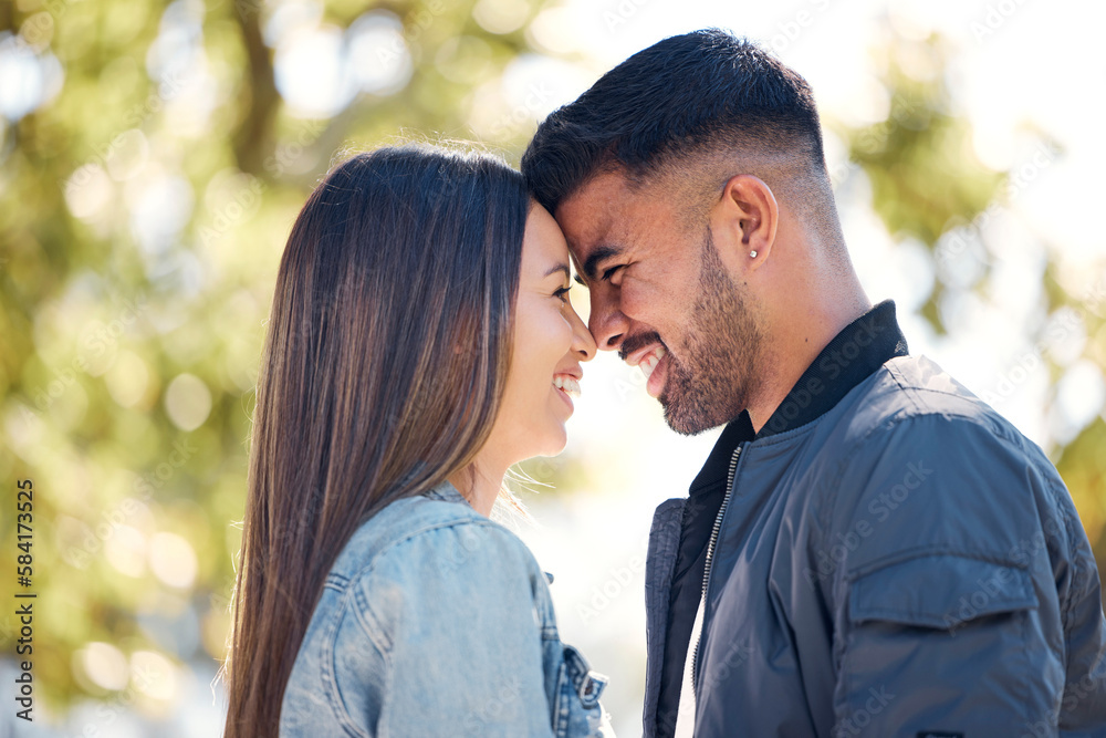 Fototapeta premium Happy couple, outdoor and smile for love, care and happiness together in summer. Head of young man and woman at nature park for affection or laughing on a romantic date, holiday or vacation to relax