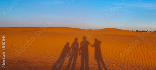 Shadow of family in the desert- Morocco