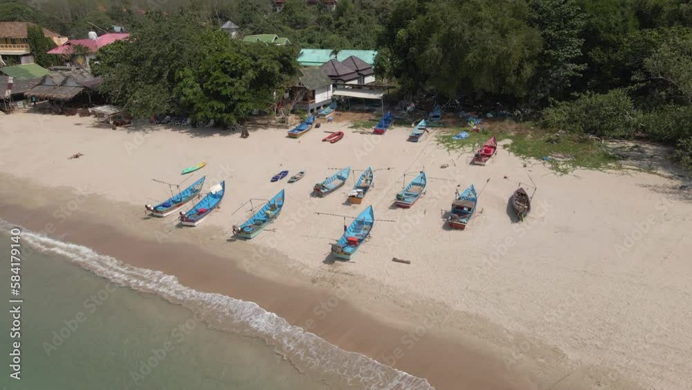 High angle view of fishing boats hauled up on sandy Kantiang Bay beach High angle view of fishing boats hauled up on sandy Kantiang Bay beach