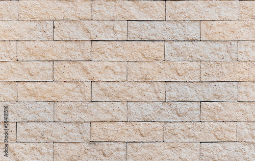 Cream color wall with pattern line brick interior background