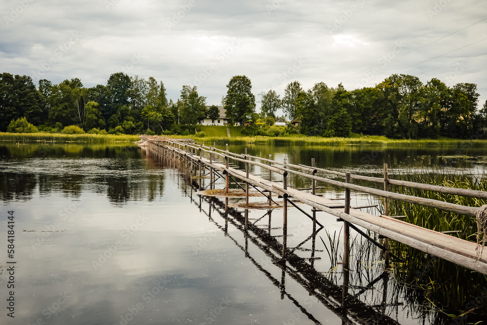 Landscapes of Latvian nature, a river and a place to catch fish, a bridge
