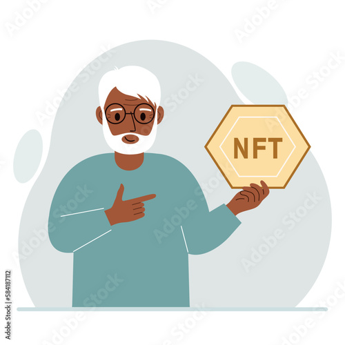NFT concept. The old man is holding nft in his hand. Works of art using non-fungible tokens for auctions, sale and purchase of works of art.