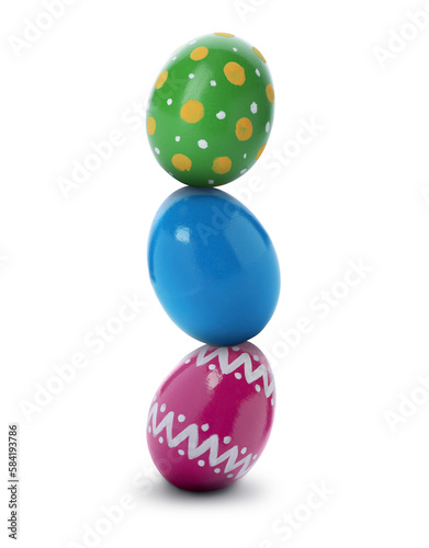 Stack of bright Easter eggs on white background
