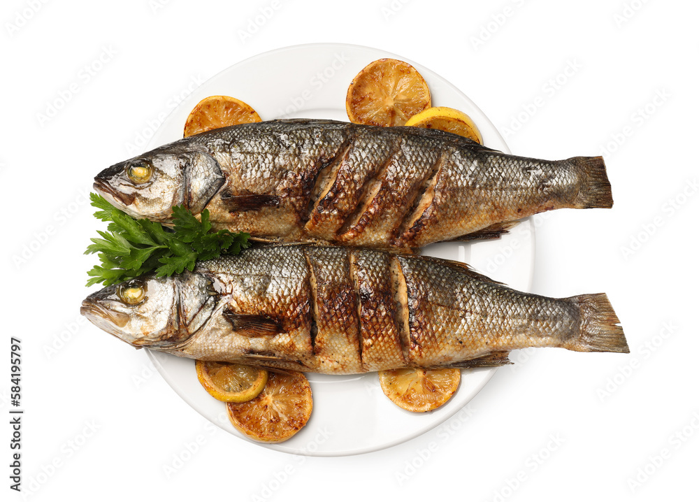 Plate with delicious sea bass fish, lemon and parsley isolated on white