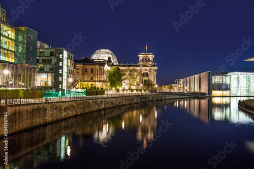 The german chancellery building in the government district in Berlin at night photo