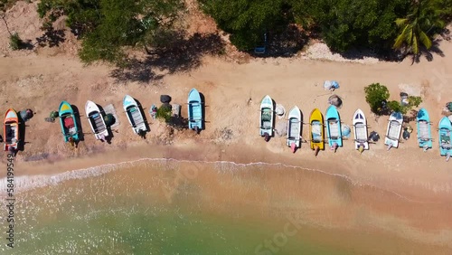Aerial view of the flight from above over the fishing boats of the south. Calm beautiful video on the background for tourism, design and advertising.