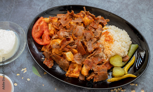 Turkish meat doner in a black plate
