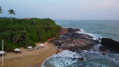 Aerial view from above on the tourist hotel shore. Calm beautiful video on the background for tourism, design and advertising.
