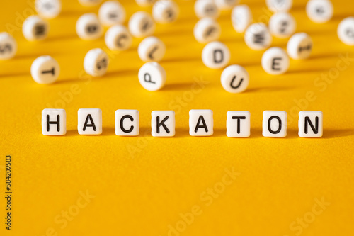 Hackaton - word concept on building blocks photo