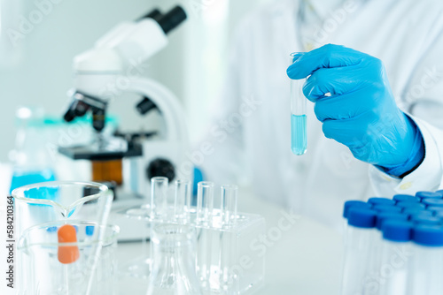Scientist analyze biochemical sample in advanced scientific laboratory. Medical professional check chemical mix microbiological developmental of viral. Biotechnology research in science lab. cosmetic