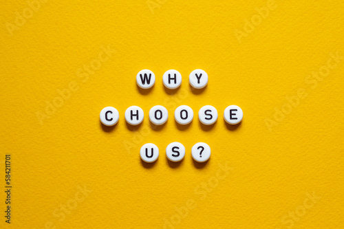 Why choose us - word concept on paper, text