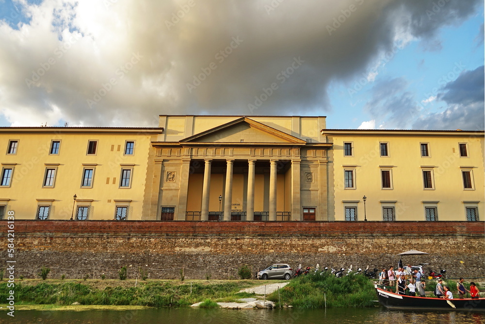 Stock exchange palace headquarters of the Florence Chamber of Commerce  seen from a boat on the Arno River, Tuscany, Italy