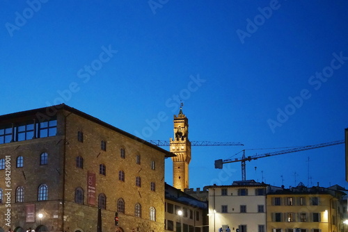 Arnolfo Tower of Palazzo Vecchio in the evening in Florence, Tuscany, Italy photo