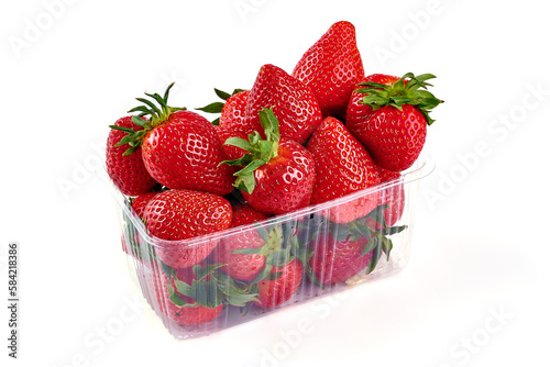 Organic strawberries, close-up, isolated on white background.