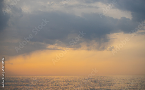 Sunset on the sea, sky with clouds, summer. © Prikhodko