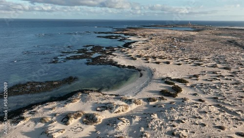 Wallpaper Mural Faro del Tostón en Fuerteventura, a vista de drone en 4k 60 fps. Torontodigital.ca