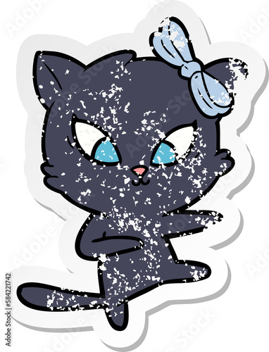 distressed sticker of a cartoon cat