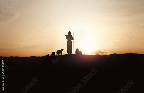 Wallpaper Mural Shepherd Jesus Christ leading the sheep and the sheep and Jesus silhouette background on the bright and brilliant sun light meadow Torontodigital.ca