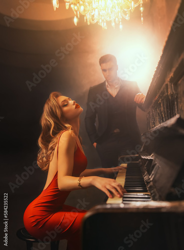 Canvastavla Luxurious sexy blonde woman pianist playing piano, party concert dark gothic scene, elegant man in black suit listens to melody music
