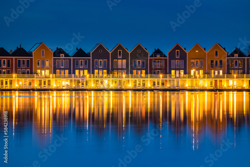 Colorful houses in Houten during the blue hour.