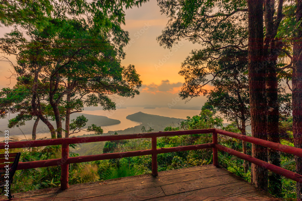 The natural background of the beautiful twilight sky, the surrounding atmosphere (trees, rivers, mountains) is a beautiful view of the journey, the view point.