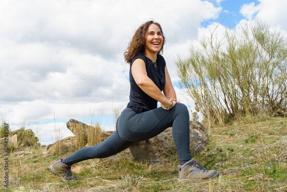 smiling woman finds inner peace through yoga in nature smiling woman finds inner peace through yoga in nature