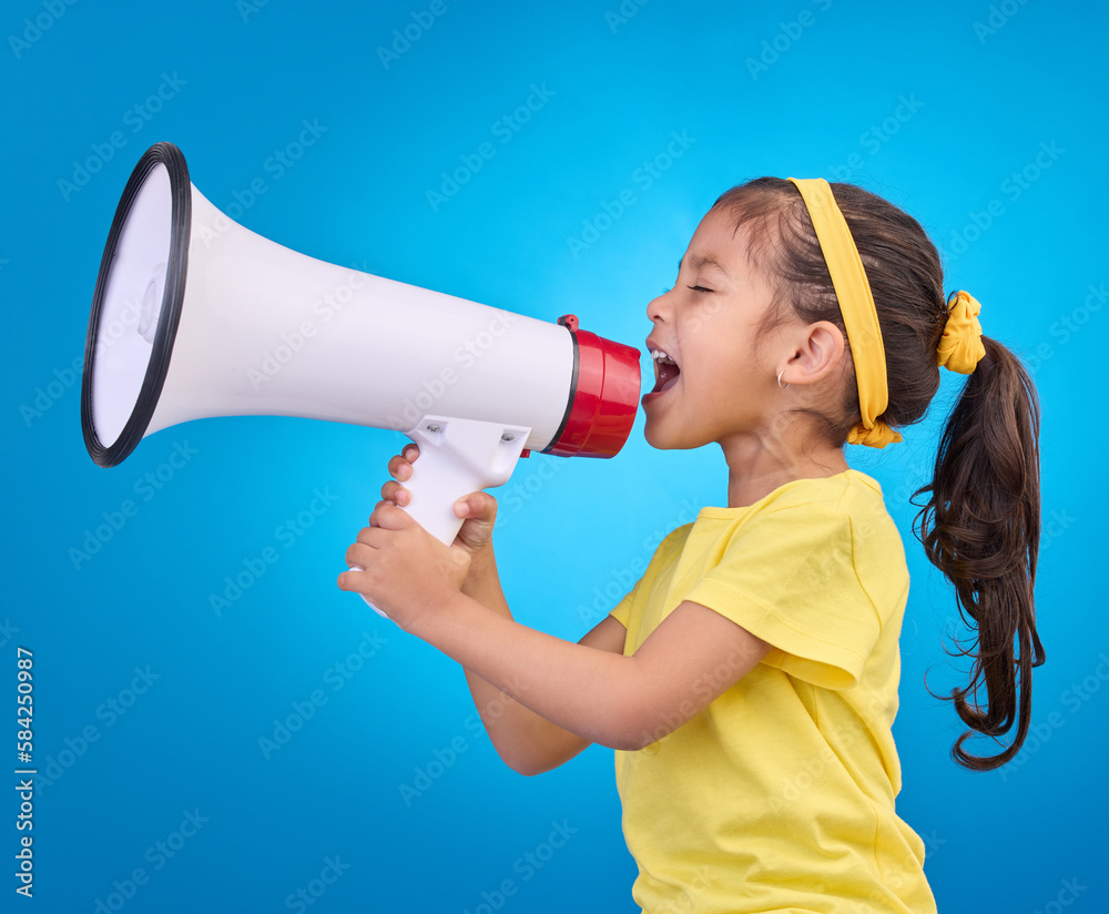 Communication, shout and child with megaphone for news, opinion and announcement on blue background. Talking, speaking mockup and young girl with loudspeaker for voice, scream and attention in studio Communication, shout and child with megaphone for news, opinion and announcement on blue background. Talking, speaking mockup and young girl with loudspeaker for voice, scream and attention in studio