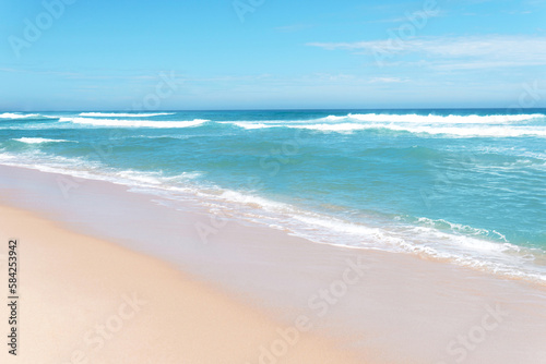 Fototapeta Naklejka Na Ścianę i Meble -  Ocean and sandy scene and cloudy blue sky on a sunny day at the seashore. Beautiful Beach in Australia Melbourne nice for relaxation and good holiday