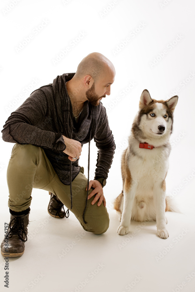 Male and Brown Husky in Studio