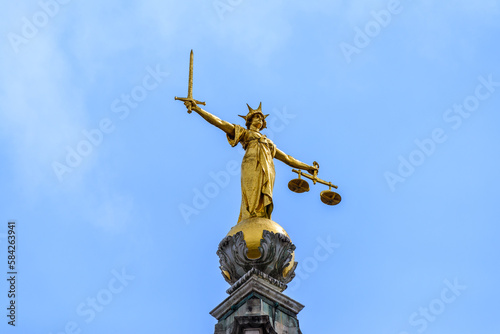Statue of Lady Justice atop the Old Bailey Statue, London, UK