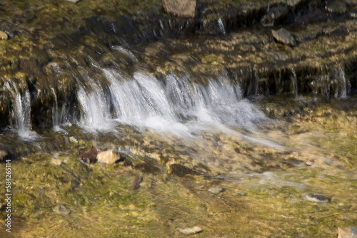 Natural waterfall over rocks