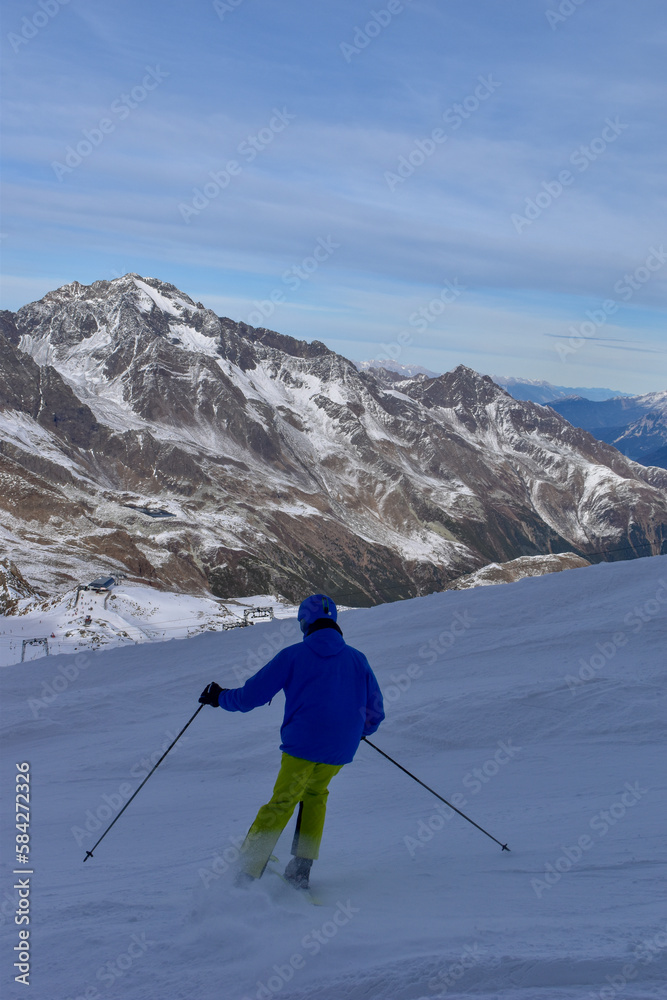 Skiing with amazing view of swiss famous mountains in beautiful winter snow.